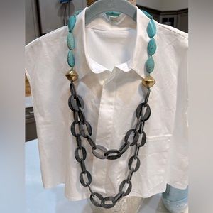 18” turquoise and grey ringed necklace with 2 gold accent beads. Hand knotted